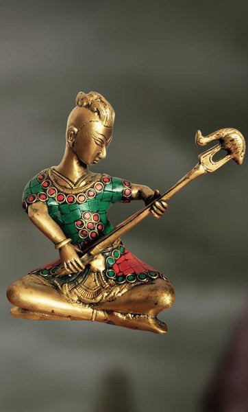 Brass Sculpture of man playing Indian musical instrument veena - Artisans  Crest